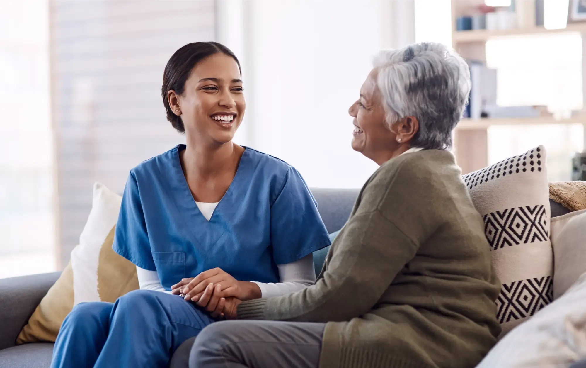 Nurse with patient laughing