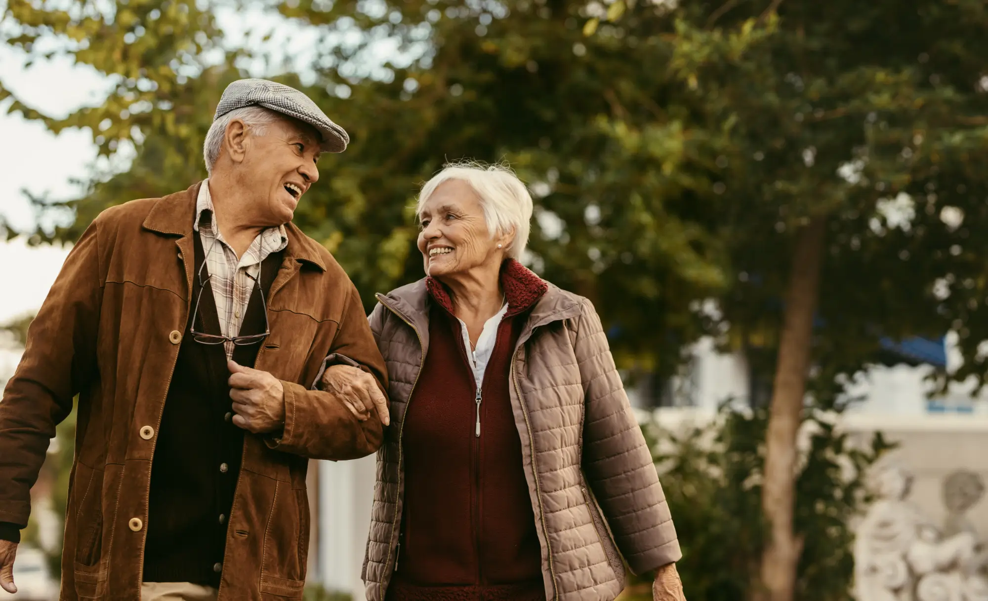Happy older couple walking