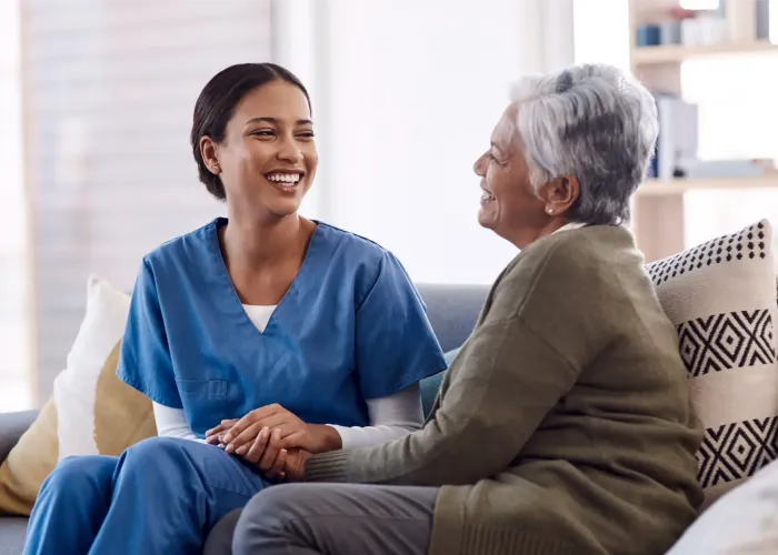 Nurse with patient laughing